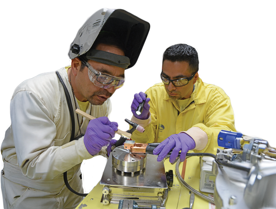 BWXT Technical Services Group TIG welding employees safety glasses on a clear background