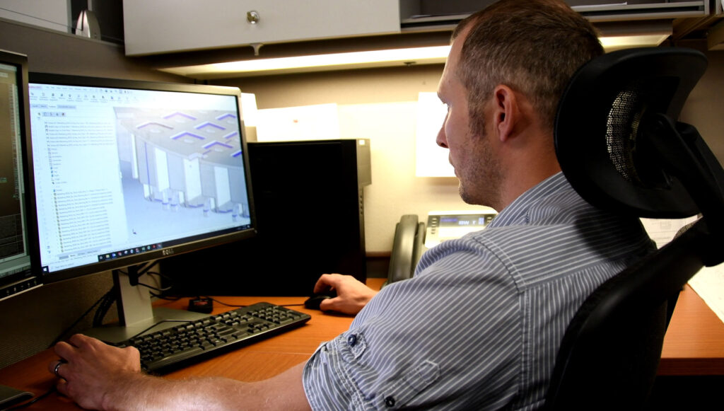 BWXT Engineer working at a computer.