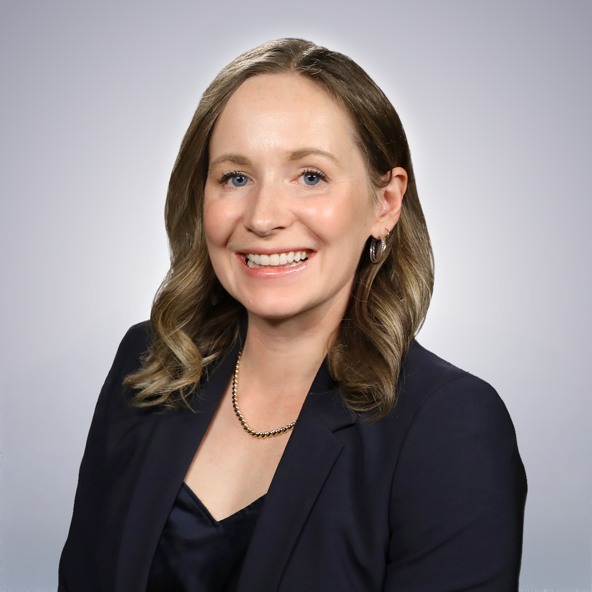 Profile picture of Kate Kelly on a white background